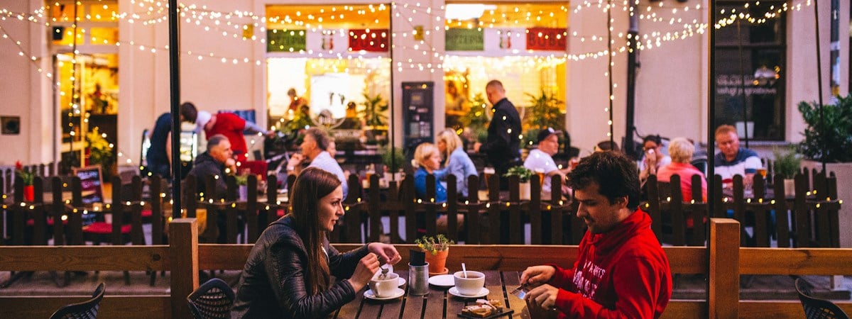 Couple on a café terrace on a first date