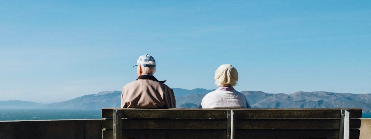 A senior couple walking together
